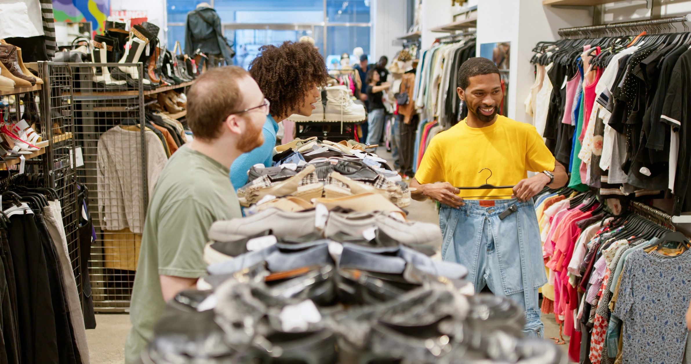 Group of stylish shoppers in a clothing boutique