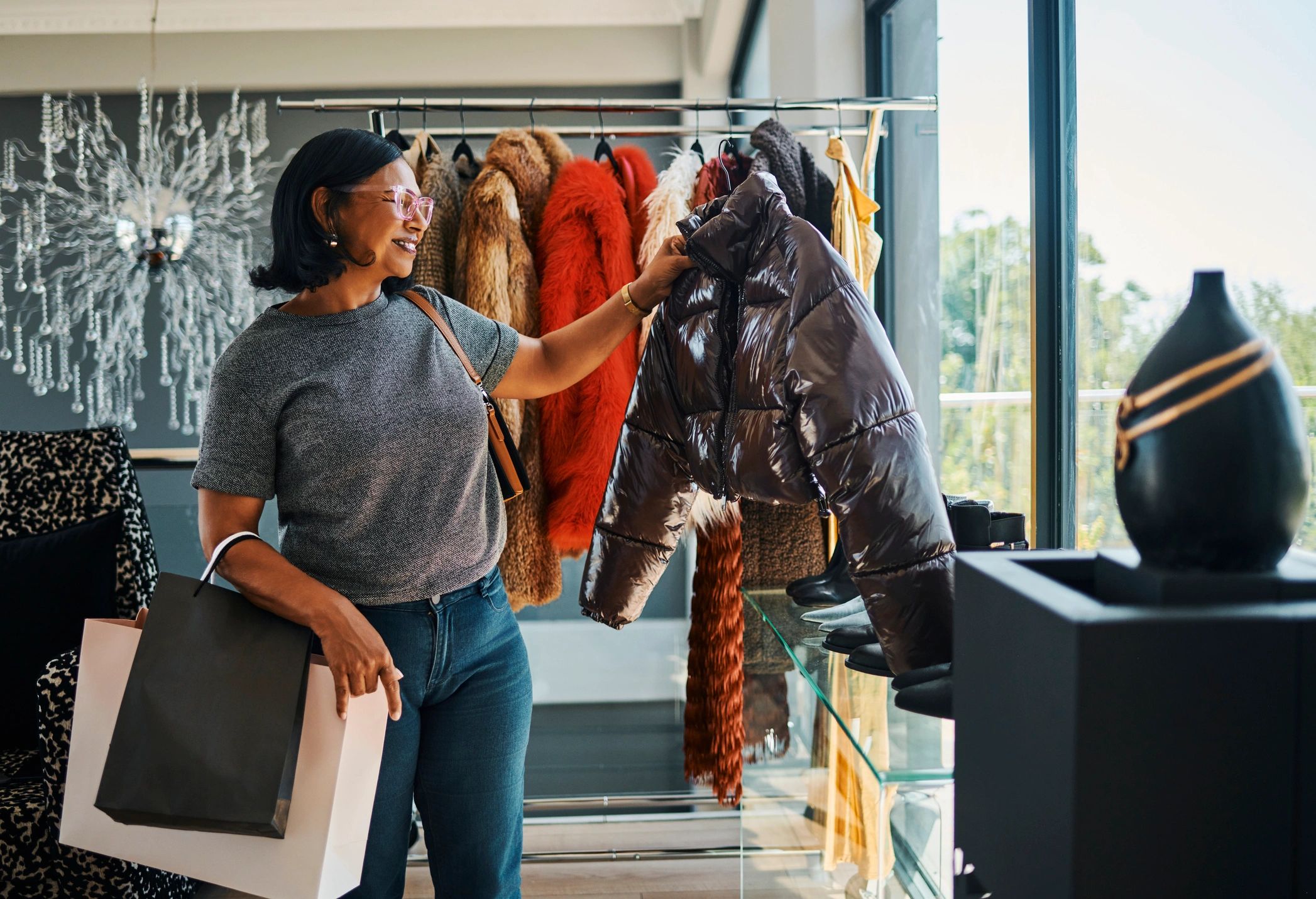 Smiling boutique shopper in a clothing store